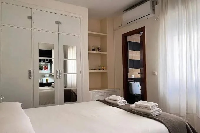 Apartment Wall Center - Aloha Sevilla, Inseratsfoto des Schlafzimmers